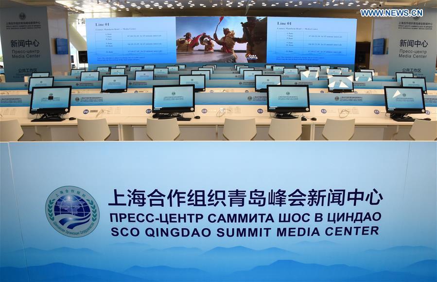 Photo taken on June 3, 2018 shows the public media working area at the media center of the 18th Shanghai Cooperation Organization (SCO) Summit in Qingdao, east China\'s Shandong Province. The media center of the 18th SCO Summit will open to journalists from both home and abroad on June 6, the organizer said on Sunday. (Xinhua/Li Ziheng)