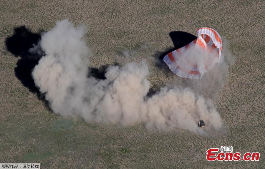 The Soyuz MS-07 capsule carrying the crew of Norishige Kanai of Japan, Anton Shkaplerov of Russia, and Scott Tingle of the U.S. lands in a remote area outside the town of Dzhezkazgan, Kazakhstan June 3, 2018.(Photo/Agencies)