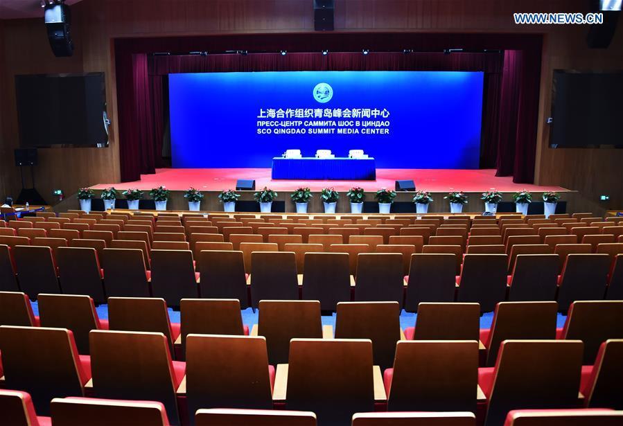 Photo taken on June 3, 2018 shows a press conference hall of the media center of the 18th Shanghai Cooperation Organization (SCO) Summit in Qingdao, east China\'s Shandong Province. The media center of the 18th SCO Summit will open to journalists from both home and abroad on June 6, the organizer said on Sunday. (Xinhua/Li Ziheng)