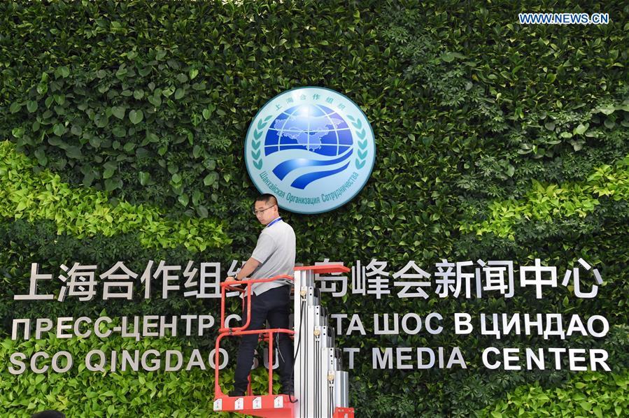Photo taken on June 3, 2018 shows the inquiry desk at the media center of the 18th Shanghai Cooperation Organization (SCO) Summit in Qingdao, east China\'s Shandong Province. The media center of the 18th SCO Summit will open to journalists from both home and abroad on June 6, the organizer said on Sunday. (Xinhua/Li Ziheng)