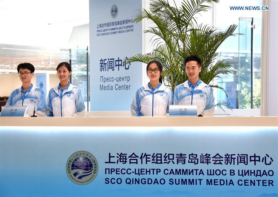 Photo taken on June 3, 2018 shows the inquiry desk at the media center of the 18th Shanghai Cooperation Organization (SCO) Summit in Qingdao, east China\'s Shandong Province. The media center of the 18th SCO Summit will open to journalists from both home and abroad on June 6, the organizer said on Sunday. (Xinhua/Li Ziheng)