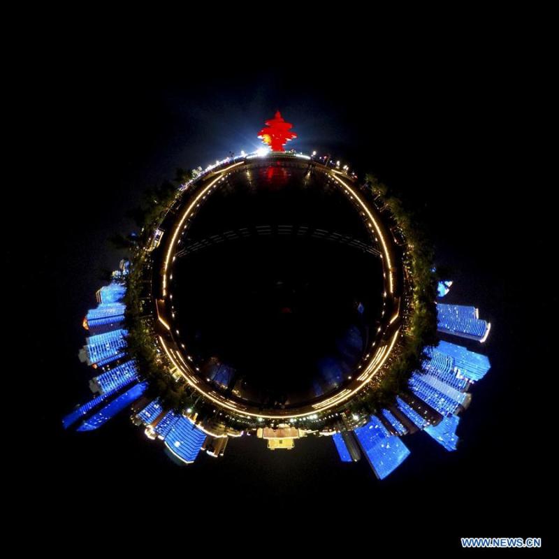 Panorama photo taken on June 2, 2018 shows the night view of Wusi Square in Qingdao, east China\'s Shandong Province. The 18th Shanghai Cooperation Organization (SCO) Summit is scheduled for June 9 to 10 in Qingdao. (Xinhua/Yin Gang)