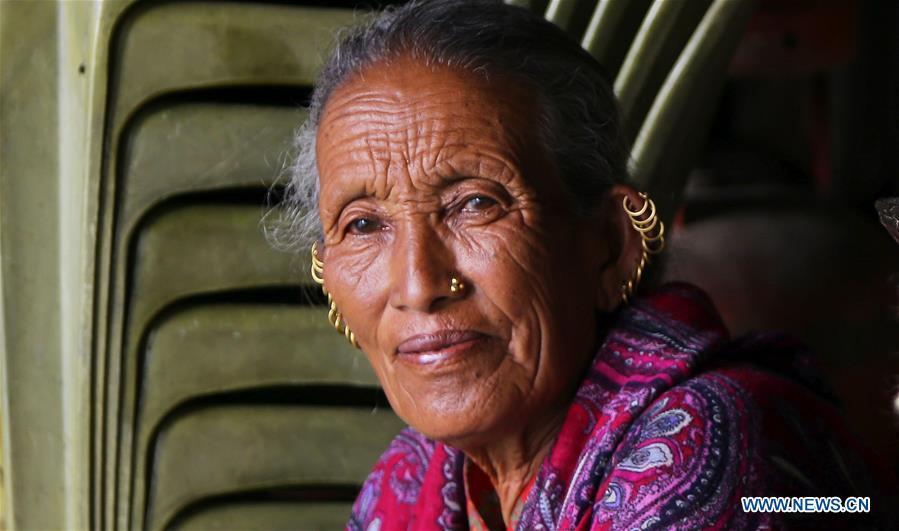 A woman is seen at Ghandruk village of Kaski district in Nepal, June 6, 2018. (Xinhua/Sunil Sharma)