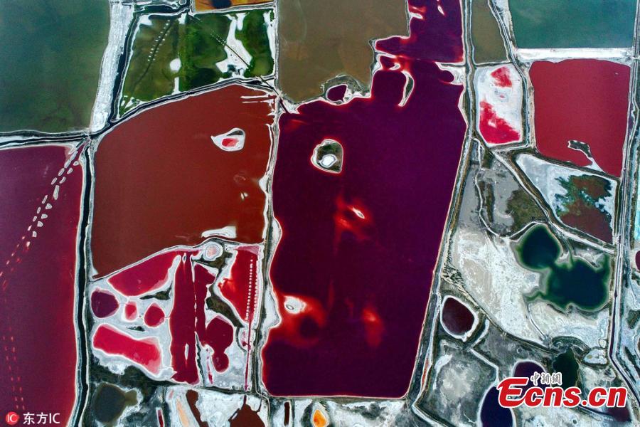 An aerial view of a colorful salt lake in Yuncheng, Shanxi Province, June 6, 2018. Formed approximately 500 million years ago, the salt lake, known as China\'s \