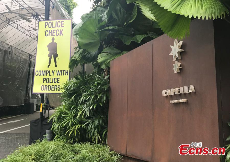 A sign for a police check stands near the Capella Resort on Sentosa Island, Singapore, June 10, 2018. The summit between United States President Donald Trump and Democratic People\'s Republic of Korea supreme leader Kim Jong-un will be held at the Capella Resort. (Photo: China News Service/Xu Fangqing)