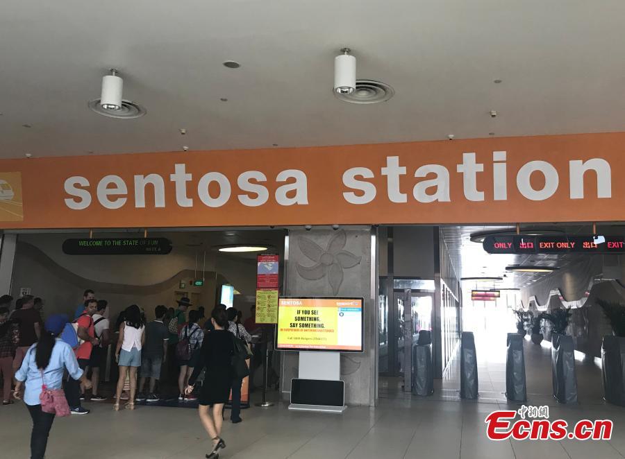Passengers are seen at Sentosa Station on Sentosa Island, Singapore, June 10, 2018. (Photo: China News Service/Meng Xiangjun)