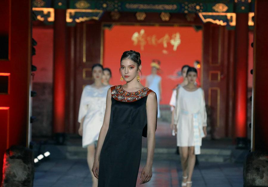 Models present designs by D.Rita at the Prince Kung\'s Mansion in Beijing, June 8, 2018. The runway is a part of \