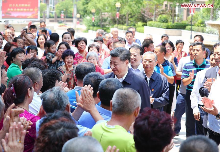 <?php echo strip_tags(addslashes(Chinese President Xi Jinping, also general secretary of the Communist Party of China Central Committee and chairman of the Central Military Commission, visits a community in Licang District during an inspection tour in Qingdao, east China's Shandong Province, June 12, 2018. (Xinhua/Xie Huanchi))) ?>