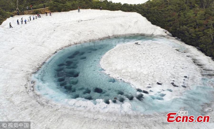In this aerial image, Kagaminuma Pond is seen on June 5, 2018 in Iwate, Japan. Snow melting water creates an eye-shaped pond on the Hachimantai mountain.  (Photo/VCG)