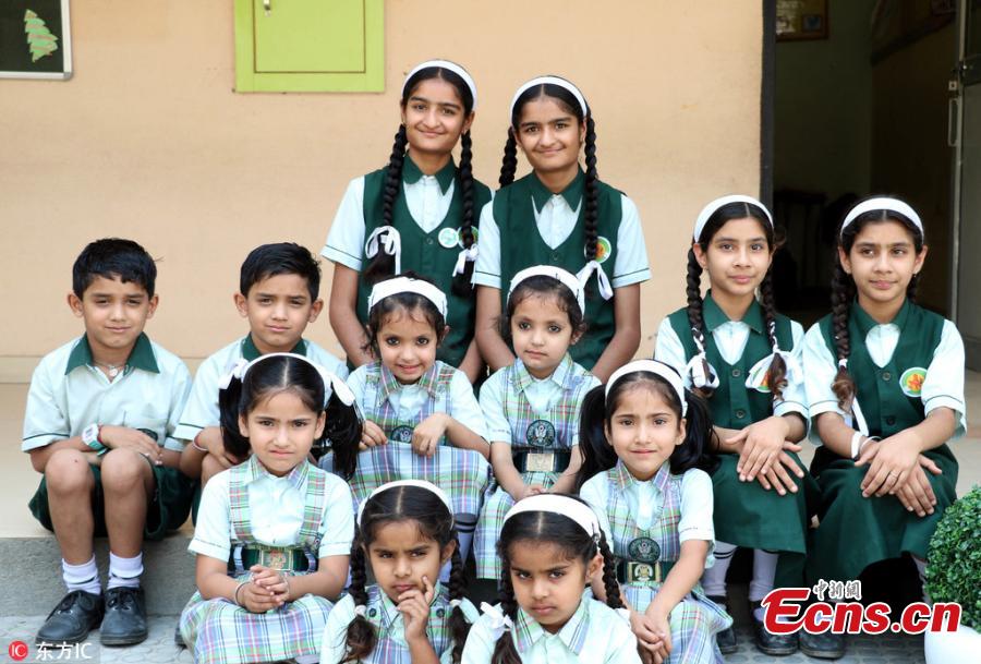 The Green Land Public School in Pathankot in Punjab, India, is unique as it has 17 pairs of twins aged between three and 15. They are nearly all identical and look so same that even teachers are confused to identify who is who,” said Dr. Jyoti Thakur, the principal of the school. (Photo/IC)