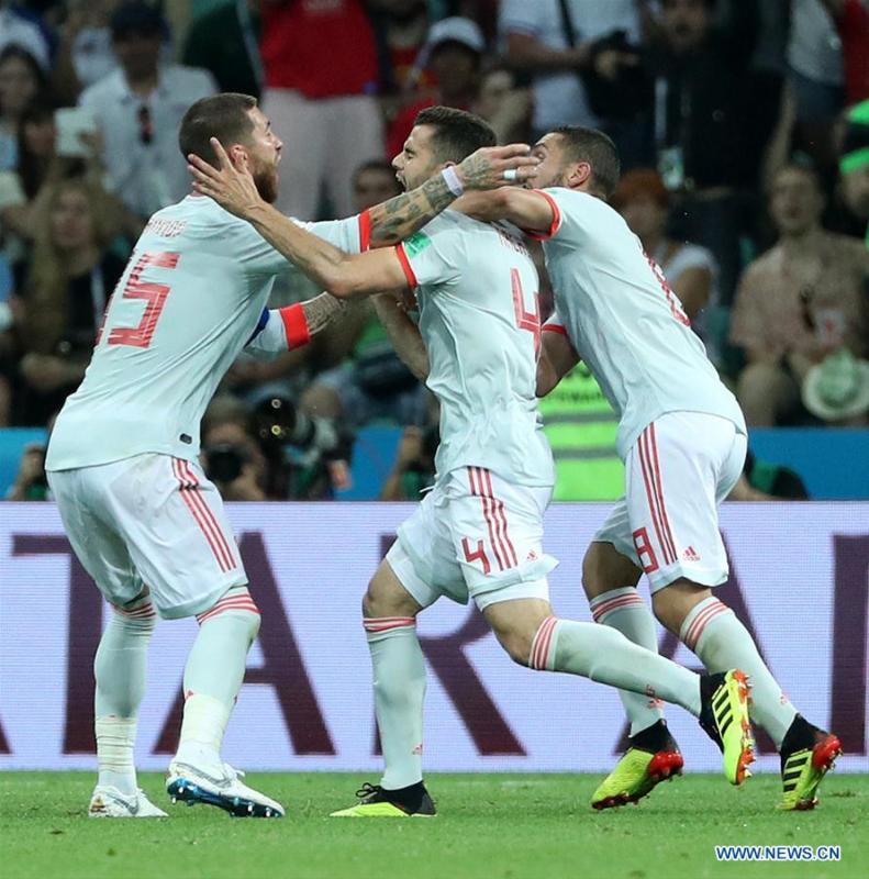 Nacho (C) of Spain celebrates scoring with his teammates during a group B match between Portugal and Spain at the 2018 FIFA World Cup in Sochi, Russia, June 15, 2018. (Xinhua/Ye Pingfan)
