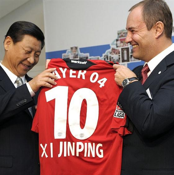 [Photo/people.cn]

Oct 14, 2009

Xi Jinping receives a Bayer Leverkusen soccer shirt while visiting the German pharmaceutical company Bayer in Germany.

Although China is not participating in the 2018 FIFA World Cup, it is likely that it will host the event in the future. At least two of Xi\'s dreams about World Cup could be realized soon and China is moving toward the third dream since it has unveiled ambitious plans to uplift the soccer level.