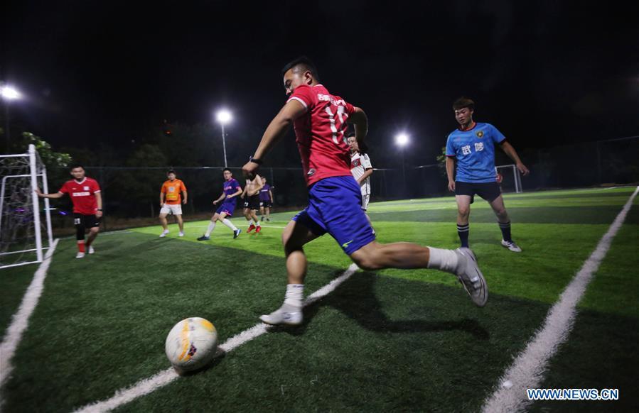 <?php echo strip_tags(addslashes(Football fans compete on a field in Wuzhi County of Jiaozuo City, central China's Henan Province, June 19, 2018. People enjoy the fun of playing football as the 2018 FIFA World Cup goes on in Russia. (Xinhua/Feng Xiaomin))) ?>