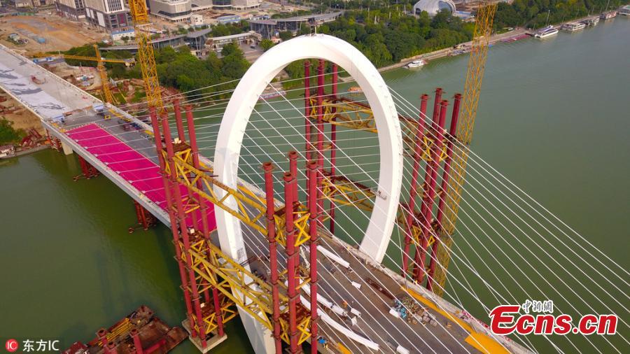 The main structure of the Baisha Bridge in Liuzhou City, South China’s Guangxi Zhuang Autonomous Region, is complete. It’s the world’s largest asymmetrical cable-stayed bridge, with the highest point of the main tower at 106 meters. (Photo/IC)