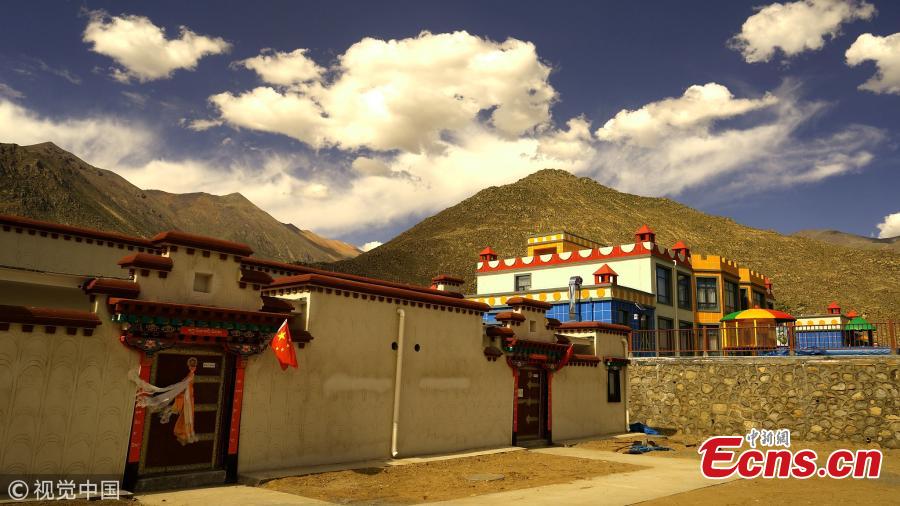 <?php echo strip_tags(addslashes(A view of newly built homes for relocated residents in Doilungdeqen District, Lhasa City, Southwest China’s Tibet Autonomous Region, June 20, 2018. Residents who once lived in Rongma Township of Nyima County, which averages 5,000 meters above sea level and faces difficulties in poverty alleviation, have been relocated to new homes at an altitude of 3,800 meters. The ecological relocation stretching more than 1,000 kilometers can also help conserve wild animals on the Northern Tibet Plateau. (Photo/VCG))) ?>