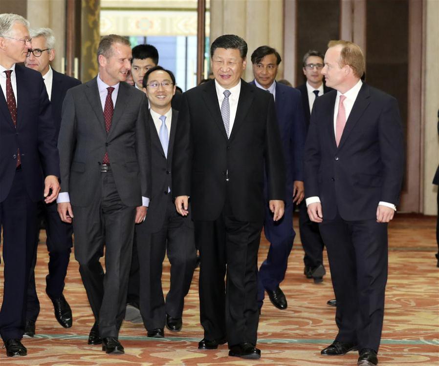 <?php echo strip_tags(addslashes(Chinese President Xi Jinping (2nd R, front) meets with executives of some famous multinational enterprises, who are in Beijing to attend a special session of round-table summit of Global CEO Council at the Diaoyutai State Guesthouse in Beijing, capital of China, June 21, 2018. Xi attended a symposium with the executives here on Thursday. (Xinhua/Ding Lin))) ?>