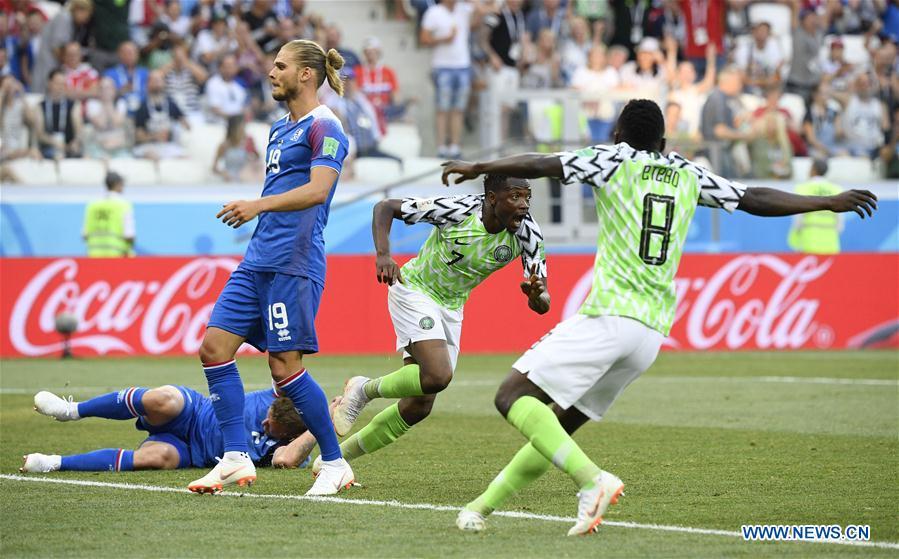 <?php echo strip_tags(addslashes(Ahmed Musa (C) of Nigeria celebrates his scoring during the 2018 FIFA World Cup Group D match between Nigeria and Iceland in Volgograd, Russia, June 22, 2018. (Xinhua/Lui Siu Wai))) ?>