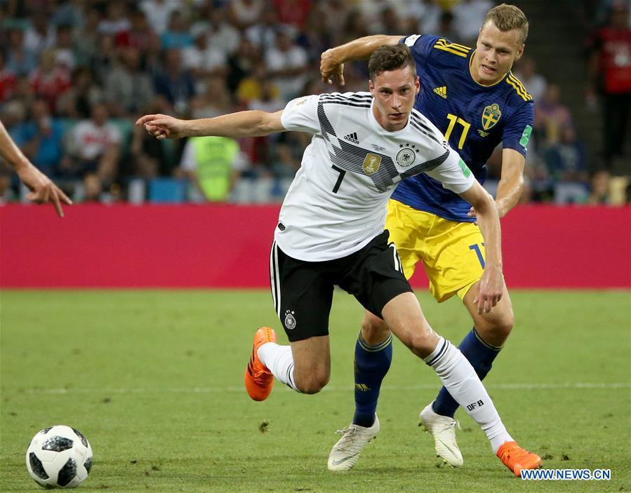 Julian Draxler (front) of Germany vies with Viktor Claesson of Sweden during the 2018 FIFA World Cup Group F match between Germany and Sweden in Sochi, Russia, June 23, 2018. Germany won 2-1.(Xinhua/Li Ming)