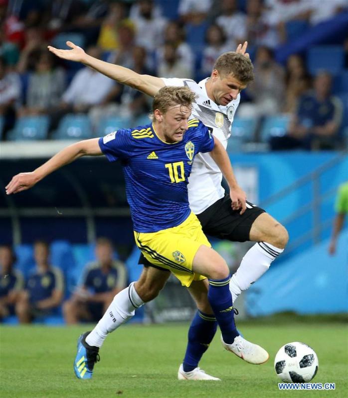 <?php echo strip_tags(addslashes(Thomas Mueller (R) of Germany vies with Emil Forsberg of Sweden during the 2018 FIFA World Cup Group F match between Germany and Sweden in Sochi, Russia, June 23, 2018. (Xinhua/Li Ming))) ?>
