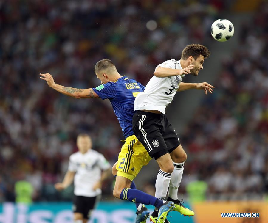Jonas Hector (R) of Germany competes for a header with Mikael Lustig of Sweden during the 2018 FIFA World Cup Group F match between Germany and Sweden in Sochi, Russia, June 23, 2018. (Xinhua/Lu Jinbo)