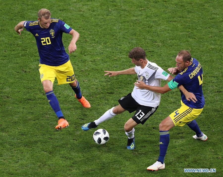 <?php echo strip_tags(addslashes(Thomas Mueller (C) of Germany vies with Andreas Granqvist (R) and Ola Toivonen of Sweden during the 2018 FIFA World Cup Group F match between Germany and Sweden in Sochi, Russia, June 23, 2018. (Xinhua/Ye Pingfan)

SOCHI, June 23 (Xinhua) -- Toni Kroos scored a winner in stoppage time from outside the penalty area to help the 10-man Germany rally past Sweden 2-1 on Saturday to stay alive at the World Cup.

Marco Reus scored in the 48th minute to pull Germany even after Ola Toivonen's goal in the first half put the Swedes in front.

<p>Germany finished with 10-men after defender Jerome Boateng was sent off following a second yellow card with 10 minutes remaining.</p>

<p>Mexico now have six points in Group F after notching up a second consecutive victory with a 2-1 win against South Korea earlier Saturday. Germany and Sweden both have three entering their final matches.</p>

<p>In the last round of the Group F, Germany will take on South Korea who suffered two losses in a row while group leaders Mexico will play against Sweden.</p>)) ?>