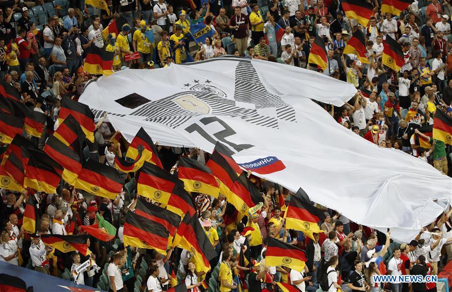 <?php echo strip_tags(addslashes(Fans of Germany display a giant team jersey prior to the 2018 FIFA World Cup Group F match between Germany and Sweden in Sochi, Russia, June 23, 2018. (Xinhua/Ye Pingfan))) ?>
