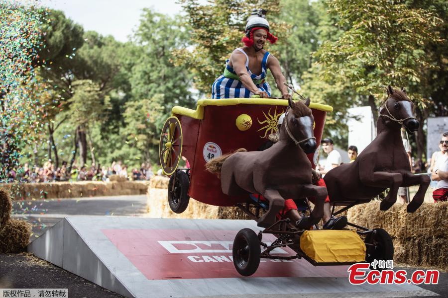 A competitor performs during the Red Bull Soapbox Race in Rome, Italy, June 24, 2018. Competitors enjoyed all kinds of twists and turns as the homemade vehicles sped down the storied slopes of The Eternal City. Red Bull Soapbox Race is an event for all those who love racing, have a sense of humor, and are interested in showing off their imagination and creativity. (Photo/Agencies)