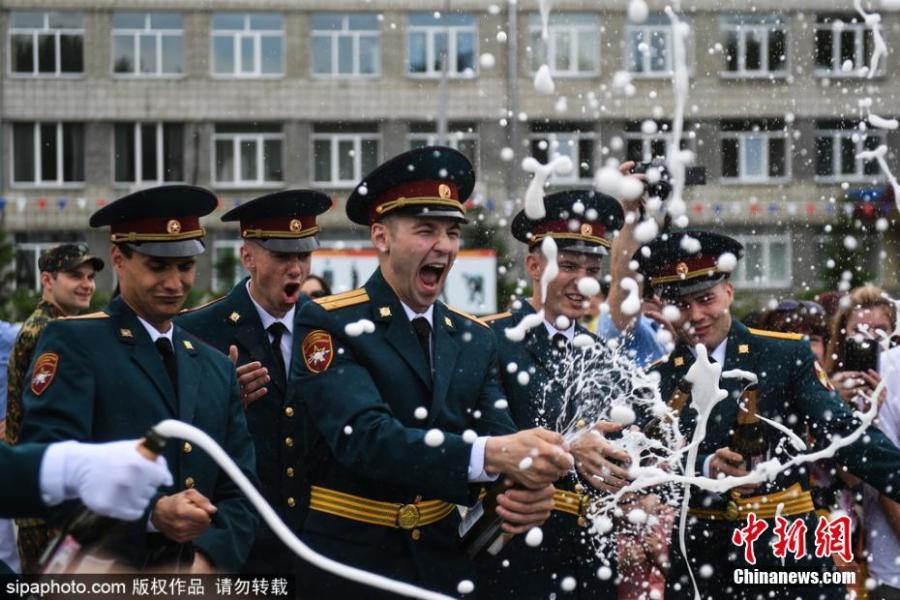 Young officers gather for a graduation ceremony at the Novosibirsk Military Institute of the Russian National Guard, June 23, 2018. (Photo/SipaPhoto)