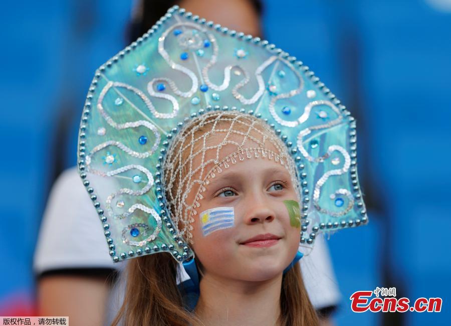 A fan watches before the World Cup match between Uruguay and Saudi Arabia, June 20, 2018. (Photo/Agencies)