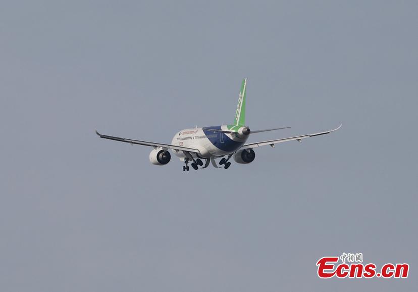 China\'s first domestically made large passenger aircraft C919 takes off from the Shanghai Pudong International Airport, June 26, 2018. C919 made trial flight again. (Photo: China News Service/Yin Liqin)