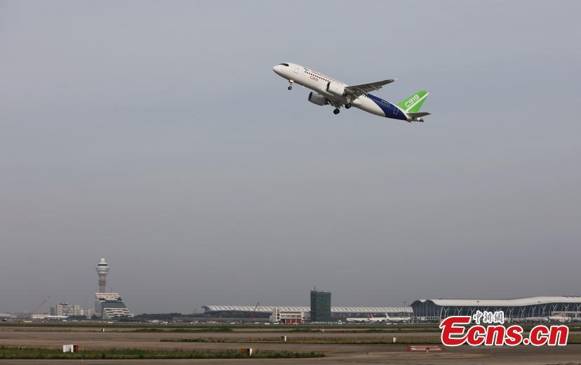 China\'s first domestically made large passenger aircraft C919 takes off from the Shanghai Pudong International Airport, June 26, 2018. C919 made trial flight again. (Photo: China News Service/Yin Liqin)