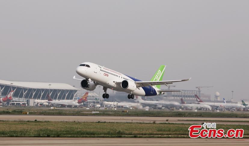 China\'s first domestically made large passenger aircraft C919 takes off from the Shanghai Pudong International Airport, June 26, 2018. C919 made trial flight again. (Photo: China News Service/Yin Liqin)