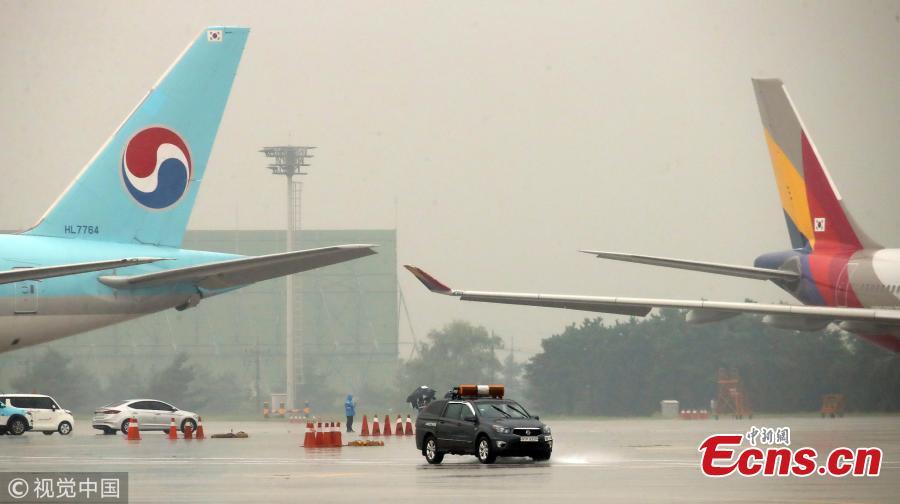 Two airplanes collide at an airport in Gimpo in western Seoul, causing damage to part of the jets, Juen 26, 2018. A passenger jet of the Korean Air, a flagship South Korean air carrier, hit its rear against a wing of the Asiana Airlines airliner. However, there has been no casualty. (Photo/VCG)
