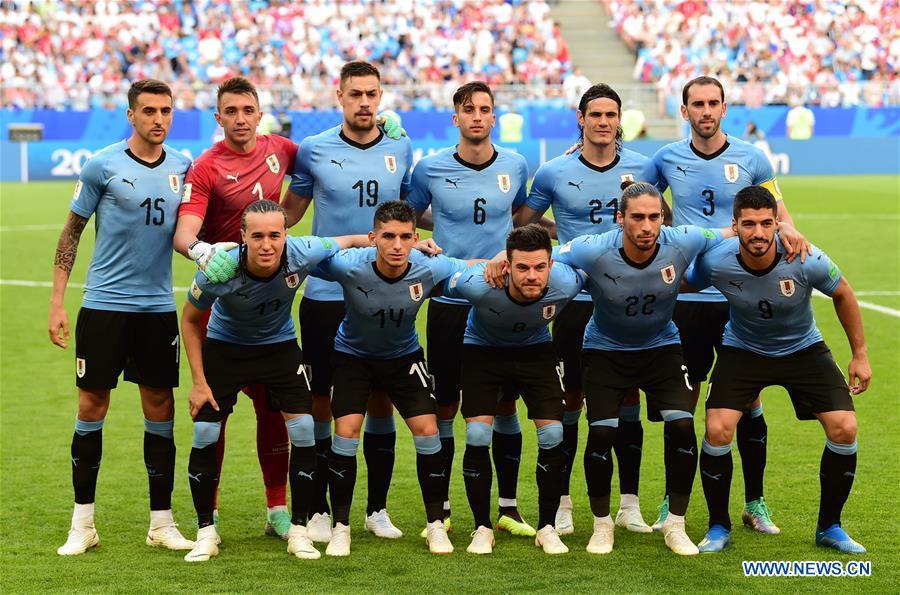 Players of Uruguay pose for a group photo prior to the 2018 FIFA World Cup Group A match between Uruguay and Russia in Samara, Russia, June 25, 2018. （Photo/Xinhua）