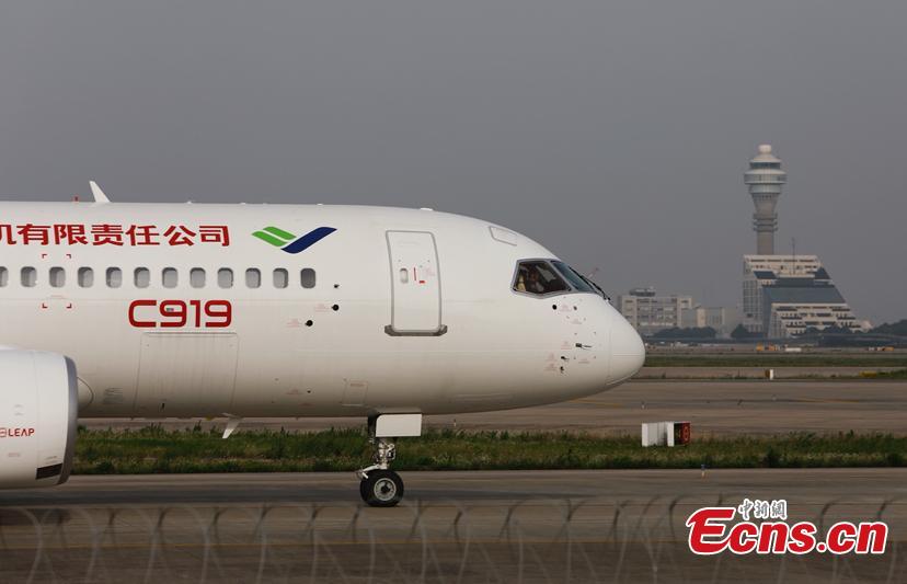 China\'s first domestically made large passenger aircraft C919 takes off from the Shanghai Pudong International Airport, June 26, 2018. C919 made trial flight again. (Photo: China News Service/Yin Liqin)