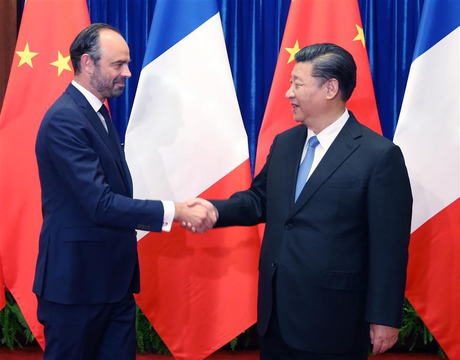 Chinese President Xi Jinping (R) meets with French Prime Minister Edouard Philippe in Beijing, capital of China, June 25, 2018. (Xinhua/Yao Dawei)