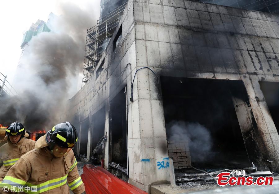A huge fire engulfs an underground parking garage of an apartment building under construction at the Treeshade apartment construction site in the central administrative city of Sejong, central South Korea, June 26, 2018. The blaze started at 1:10 p.m. local time, leaving at least three dead and 37 others injured.(Photo/VCG)