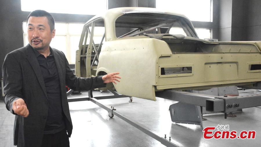 Han Yeguang, the founder of Dalian Jingdian Auto Culture Center, talks about classic cars in Dalian City, Liaoning Province, June 26, 2018. The center has hundreds of classic cars under maintenance, including a car donated by Stalin to Mao Zedong and a 1932 Rolls-Royce 20/25 car. Han said all the classic cars were either from foreign museums or private collectors, and the time taken to restore each vehicle ranged from six months to four years. (Photo: China News Service/Yang Yi)