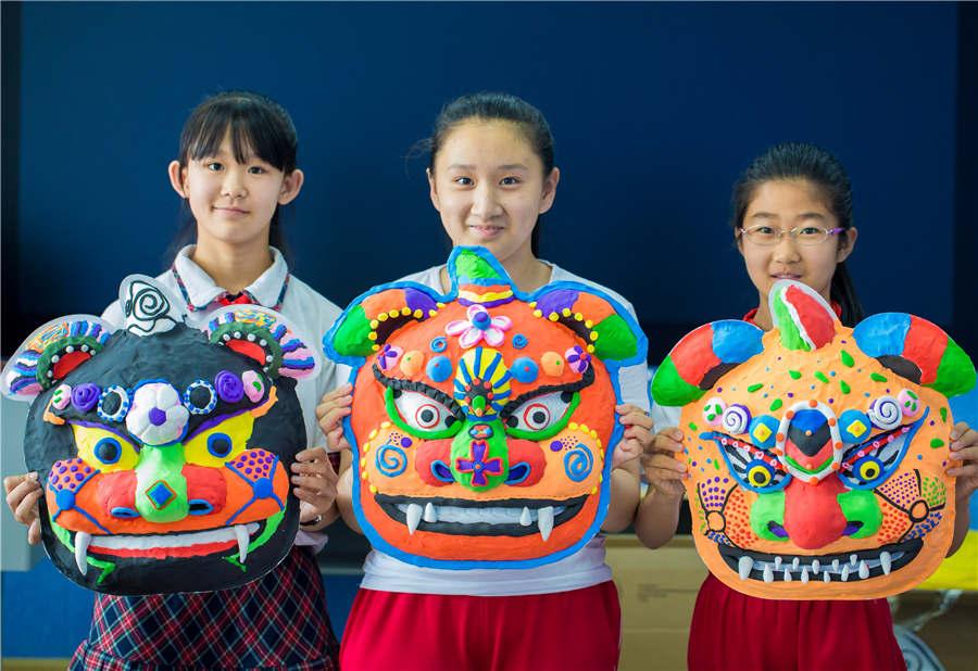 <?php echo strip_tags(addslashes(Students show their auspicious beast masks at the Nanchafang Primary School in Hohhot, Inner Mongolia autonomous region, on June 27, 2018. (Photo/Asianewsphoto))) ?>