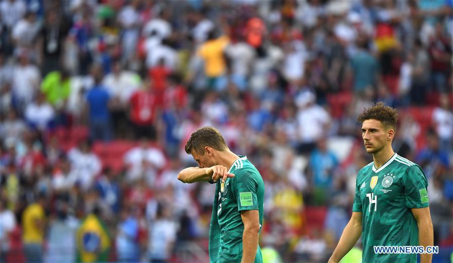 <?php echo strip_tags(addslashes(Thomas Mueller (L) of Germany reacts after the 2018 FIFA World Cup Group F match between Germany and South Korea in Kazan, Russia, June 27, 2018. South Korea won 2-0. (Xinhua/Li Ga))) ?>