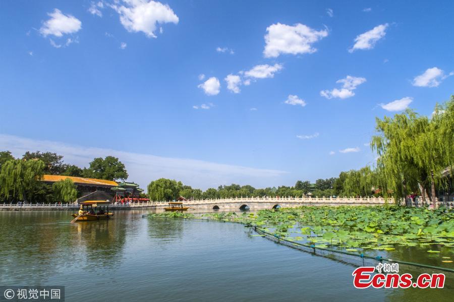 <?php echo strip_tags(addslashes(Beijing sees blue sky as high temperatures grill the city  on June 27, 2018. The heat waves will last six days. (Photo/VCG))) ?>