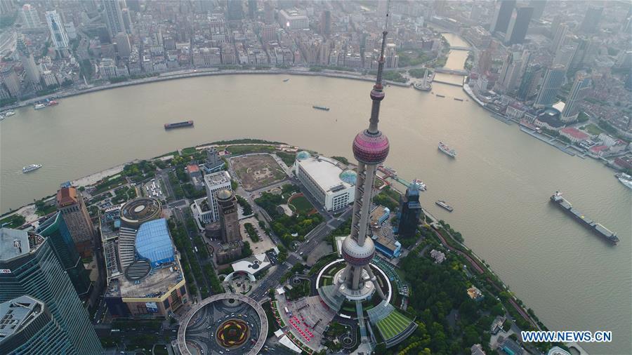 Aerial photo taken on May 14, 2017 shows scenery of the Lujiazui area in Pudong of Shanghai, east China. China announced the opening-up and development of Pudong in 1990. Pudong is expecting to take the opportunity of celebrating the 40th anniversary of China\'s reform and opening-up to continue to spearhead the country\'s reform and development. (Xinhua/Ding Ting)