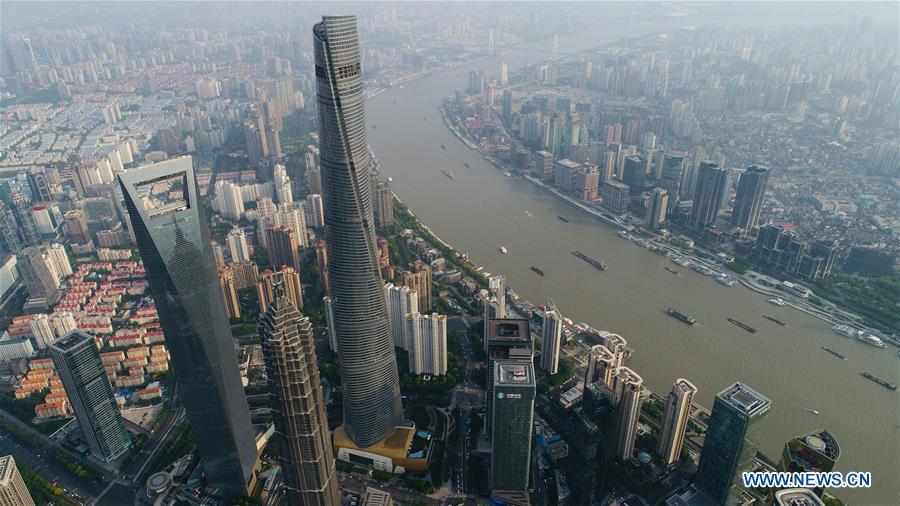 Aerial photo taken on May 14, 2017 shows scenery of the Lujiazui area in Pudong of Shanghai, east China. China announced the opening-up and development of Pudong in 1990. Pudong is expecting to take the opportunity of celebrating the 40th anniversary of China\'s reform and opening-up to continue to spearhead the country\'s reform and development. (Xinhua/Ding Ting)