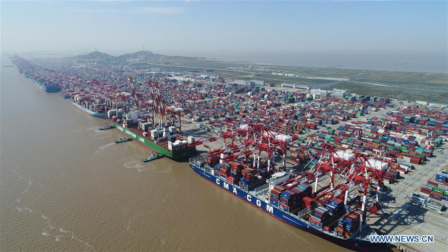 <?php echo strip_tags(addslashes(Aerial photo taken on April 23, 2017 shows a container dock of Yangshan Port in Pudong of Shanghai, east China. China announced the opening-up and development of Pudong in 1990. Pudong is expecting to take the opportunity of celebrating the 40th anniversary of China's reform and opening-up to continue to spearhead the country's reform and development. (Xinhua/Ding Ting))) ?>