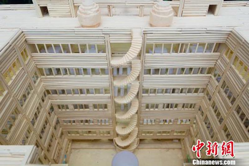 A chopsticks-made model of the library of China Three Gorges University in Yichang City, Central China’s Hunan Province, June 28, 2018. (Photo: China News Service/Yu Dongshan)