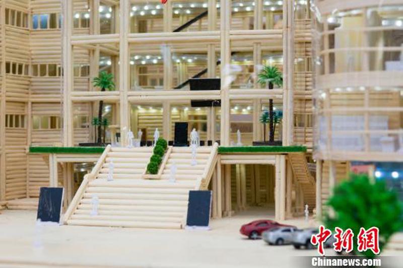 A chopsticks-made model of the library of China Three Gorges University in Yichang City, Central China’s Hunan Province, June 28, 2018. (Photo: China News Service/Yu Dongshan)