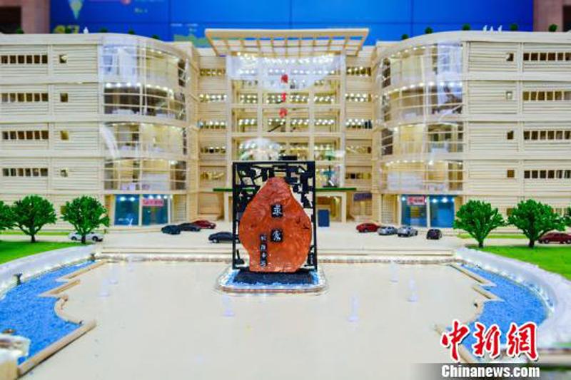 A chopsticks-made model of the library of China Three Gorges University in Yichang City, Central China’s Hunan Province, June 28, 2018. (Photo: China News Service/Yu Dongshan)