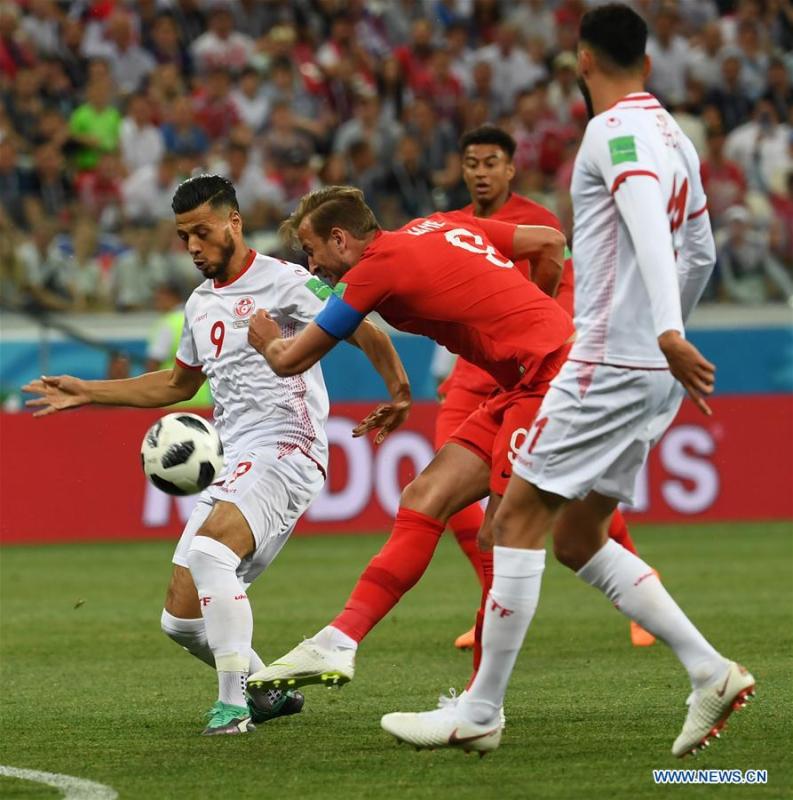 <?php echo strip_tags(addslashes(Harry Kane (C) of England shoots to score during a group G match between Tunisia and England at the 2018 FIFA World Cup in Volgograd, Russia, June 18, 2018. (Xinhua/Chen Cheng)
<br><br>
<b>Best marksman</b>
<br><br>
Harry Kane is the World Cup's top scorer so far with five goals despite being rested for England's last group match against Belgium on Thursday. The Tottenham striker is aiming to become his country's first Golden Boot winner since Gary Lineker in 1986.)) ?>
