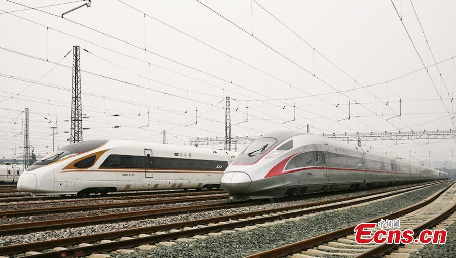 <?php echo strip_tags(addslashes(A view of the extended version of the Fuxing bullet train in Daxing District, Beijing. With a designed speed of 350 kilometers per hour, the new train is 414.26 meters long with 16 carriages, twice as many as the current Fuxing. It has 1,193 seats.  (Photo: China News Service/Zhai Lu))) ?>