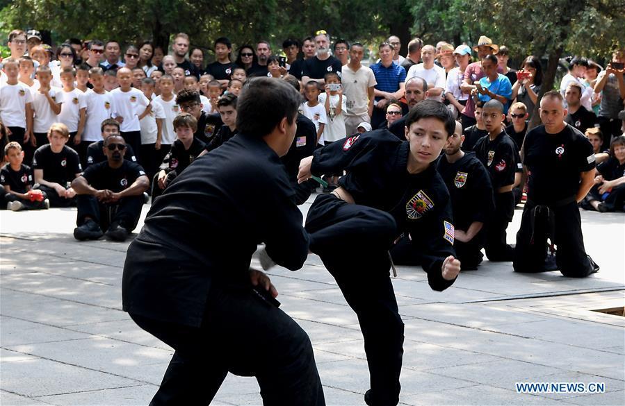 <?php echo strip_tags(addslashes(American Kungfu enthusiasts perform martial arts at Shaolin Temple on the Mount Songshan, central China's Henan Province, July 1, 2018. Over 200 Kungfu enthusiasts from America made a trip to the Shaolin Temple and performed martial arts with local monks. (Xinhua/Li An))) ?>